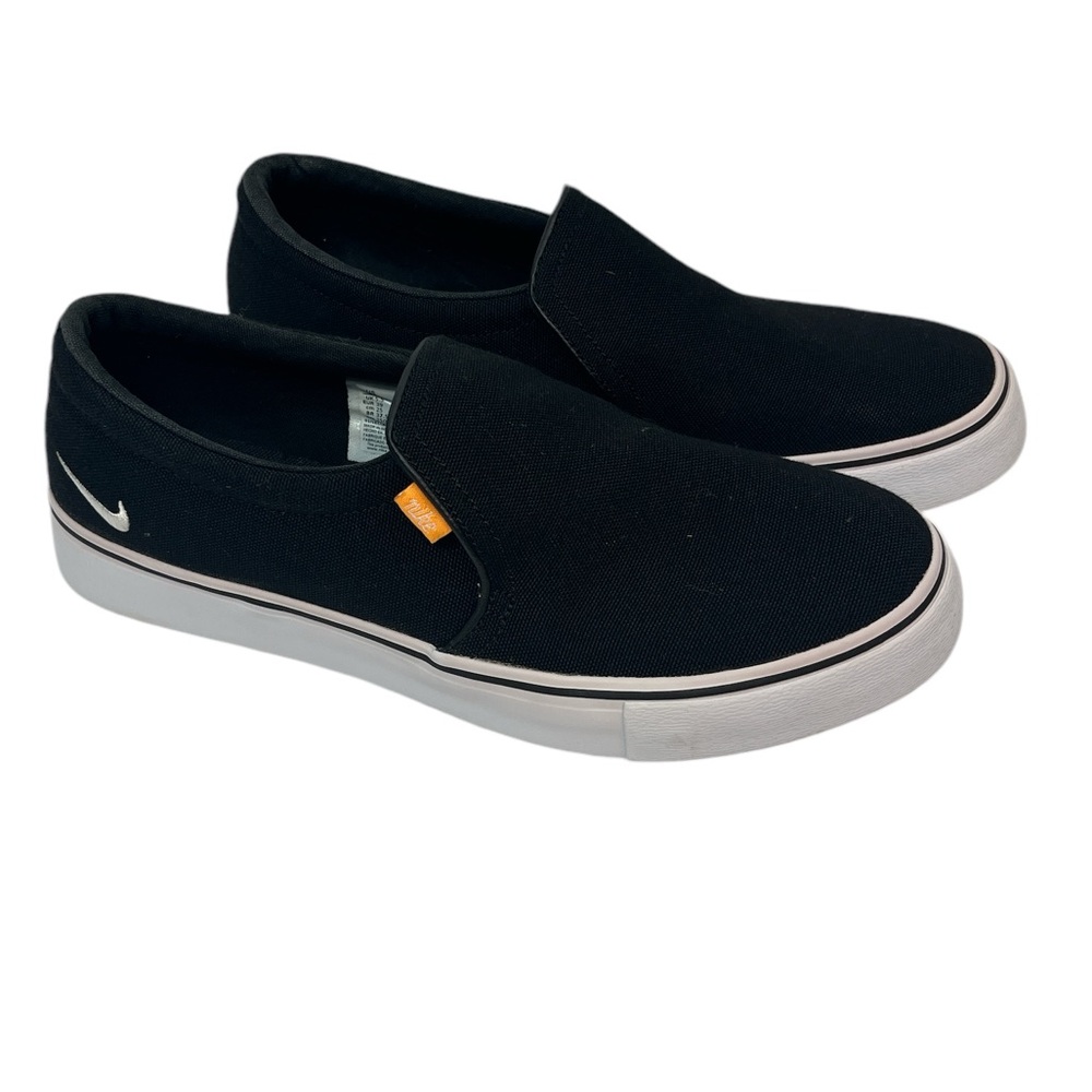 Nike woman’s black and white slip on canvas shoes size 8